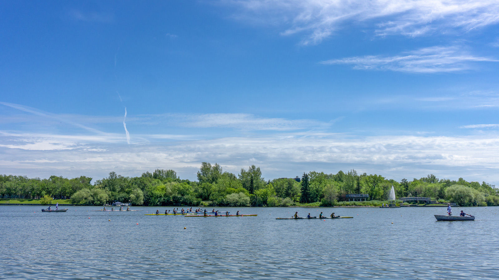 Rowers enjoy some quiet time on Wascana Lake near Regina hotels.